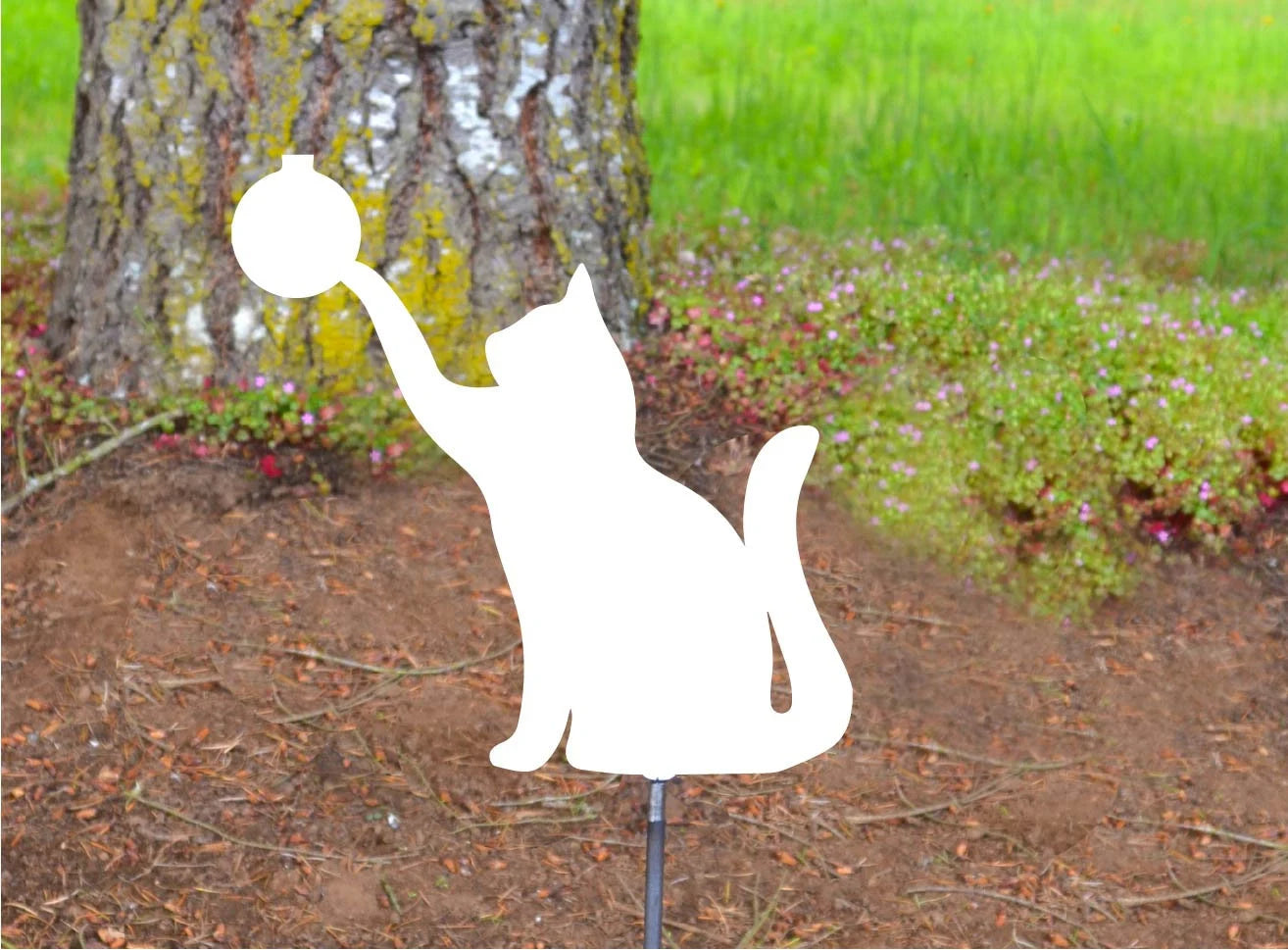 Cat Pawing at Christmas Ornament